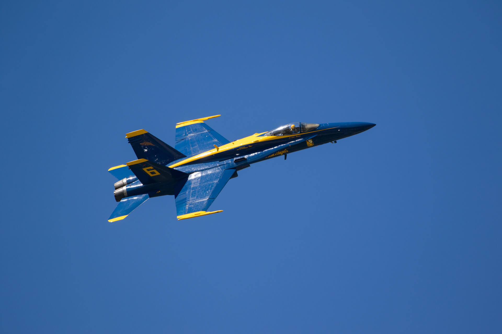 Lieutenant Tyler Davies (USN), flying Blue Angel #6, does a few flybys bright and early.