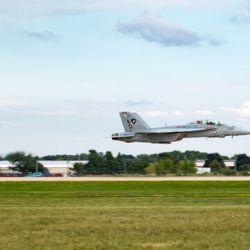 An F/A-18F Super Hornet takes off at AirVenture.